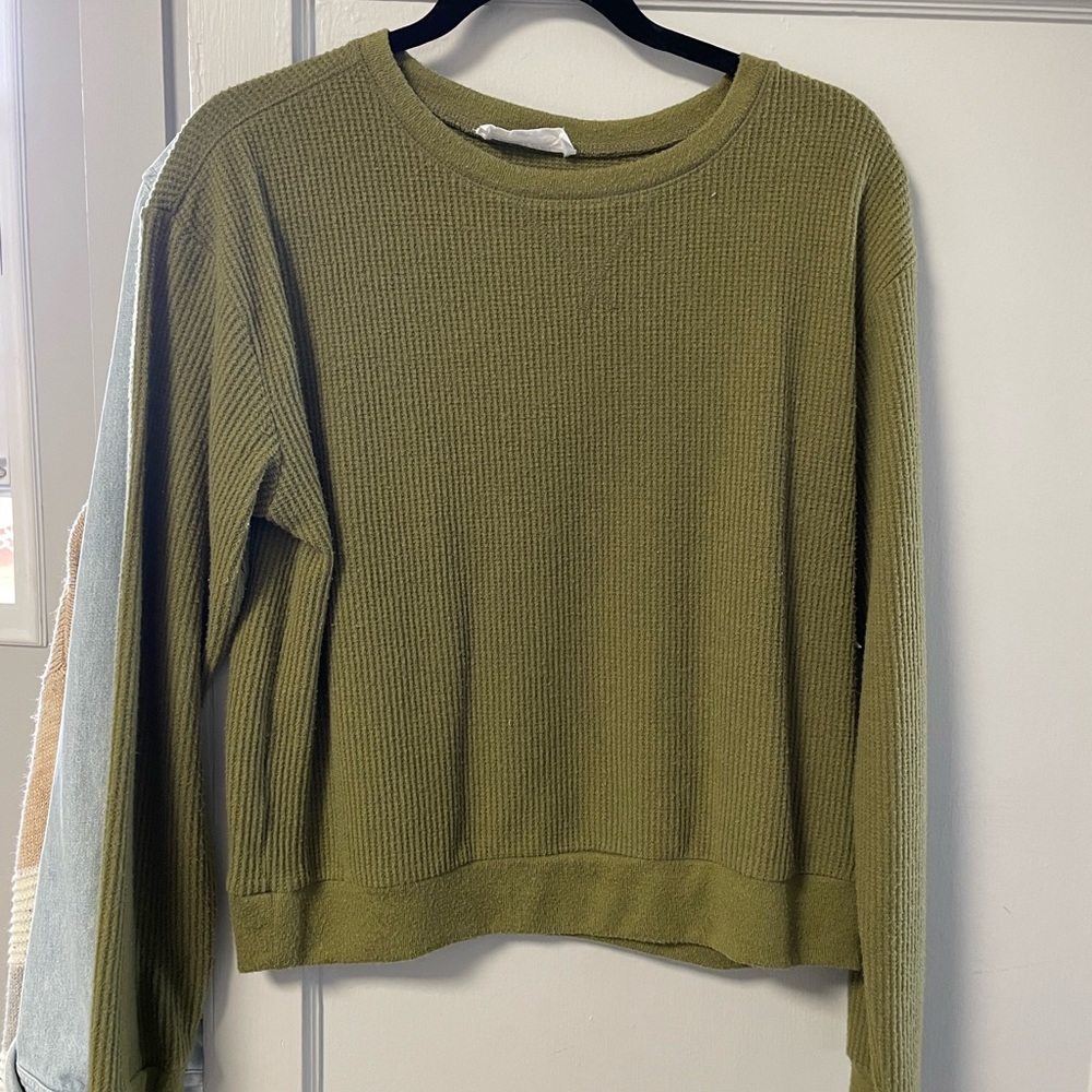 green long sleeve top